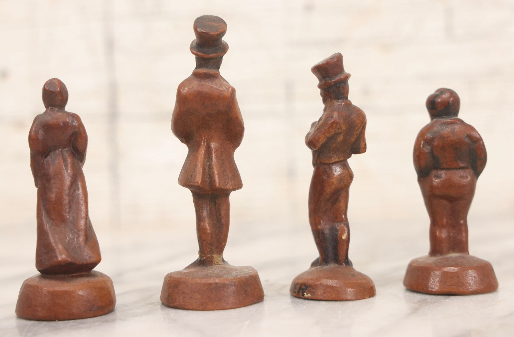Lot 072 - Grouping Of Four Vintage Composition Charles Dickens Character Figurines By Bonnie Blink Studios, Winchester, Massachusetts, “Betsy Trotwood,” “The Fat Boy,” “Sam Weller,” And “Mr. Micawber," 2-1/2" To 3-1/2" H