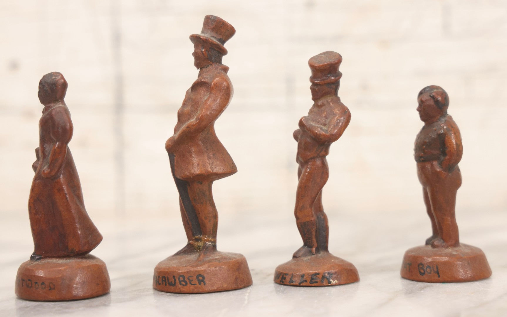 Lot 072 - Grouping Of Four Vintage Composition Charles Dickens Character Figurines By Bonnie Blink Studios, Winchester, Massachusetts, “Betsy Trotwood,” “The Fat Boy,” “Sam Weller,” And “Mr. Micawber," 2-1/2" To 3-1/2" H