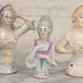 Lot 074 - Trio Of Vintage Porcelain Lady Brush Toppers, Two Marked Germany, 3-1/4" To 3-3/4" H