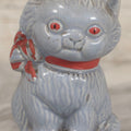 Lot 075 - Vintage Porcelain Hubley-Style Cat Still Bank With Blue Body, Red Eyes, And Red Bow, Note Damage, 4-1/2" H
