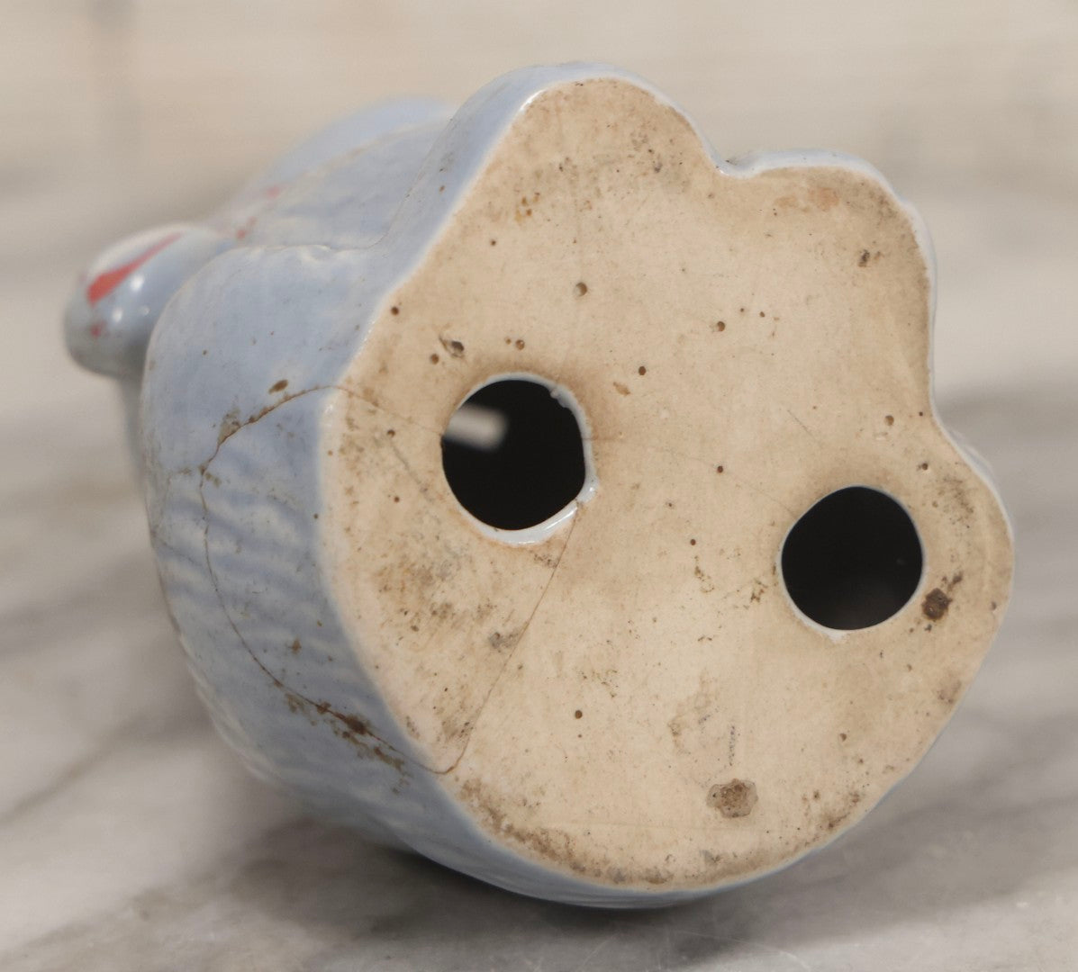 Lot 075 - Vintage Porcelain Hubley-Style Cat Still Bank With Blue Body, Red Eyes, And Red Bow, Note Damage, 4-1/2" H