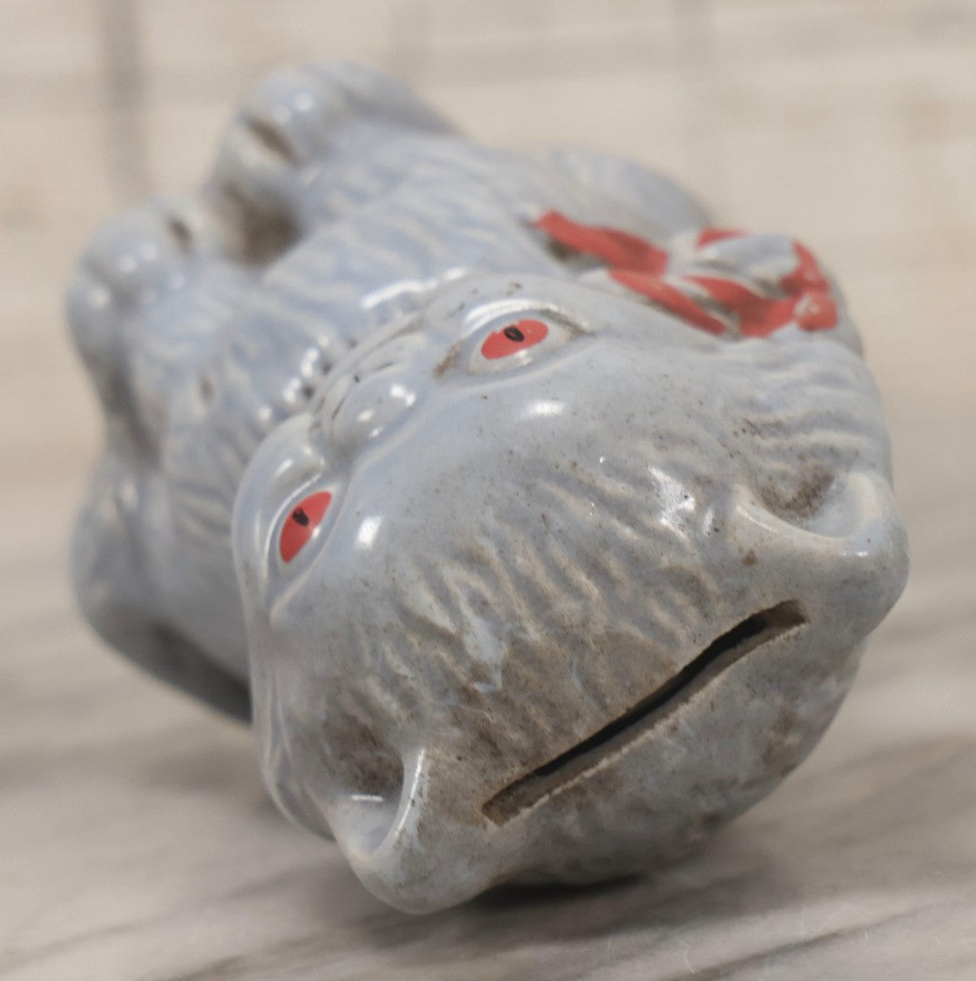 Lot 075 - Vintage Porcelain Hubley-Style Cat Still Bank With Blue Body, Red Eyes, And Red Bow, Note Damage, 4-1/2" H