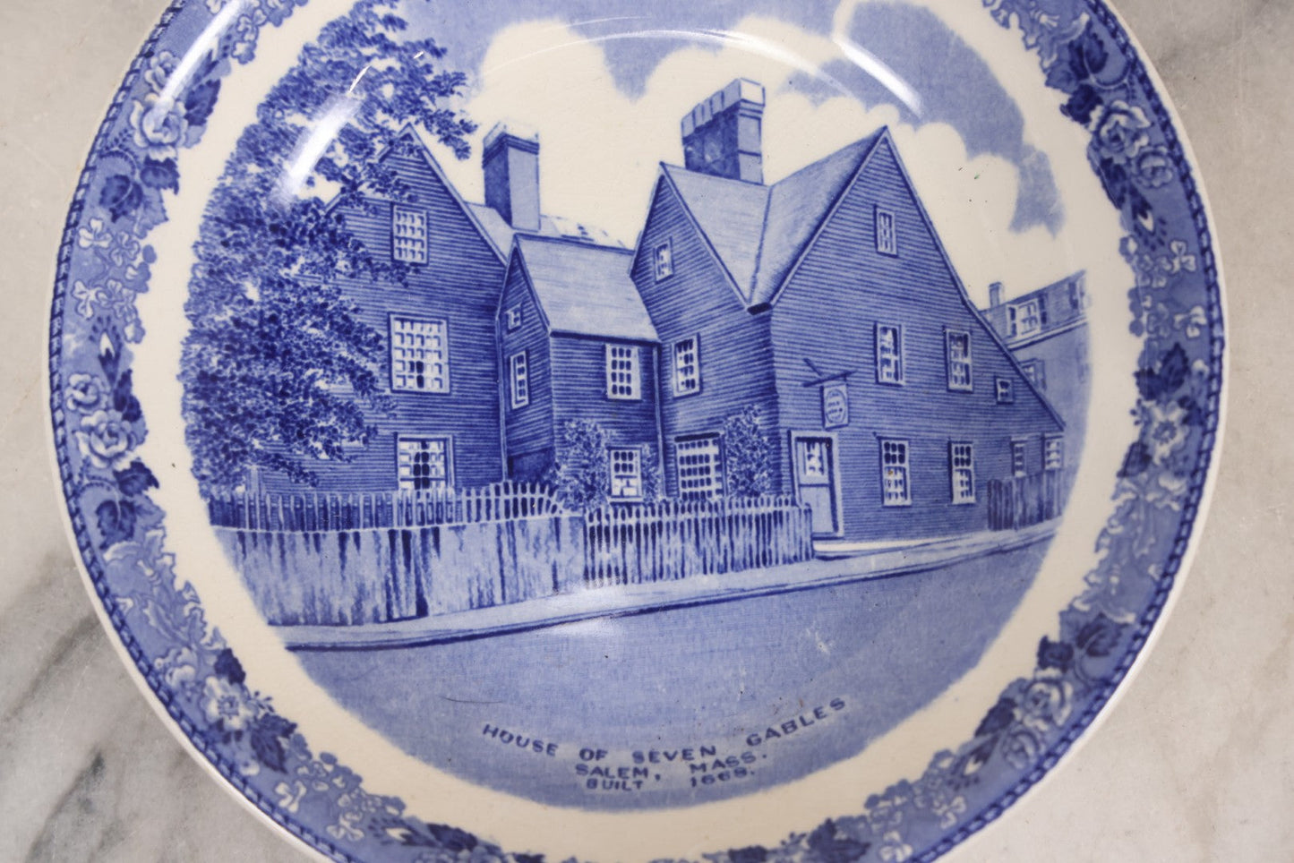 Lot 076 - Vintage Daniel Low & Co. “House Of Seven Gables, Salem, Mass.” Blue Transferware Souvenir Plate By J. Roth, Staffordshire, England, 7-1/4" Diameter