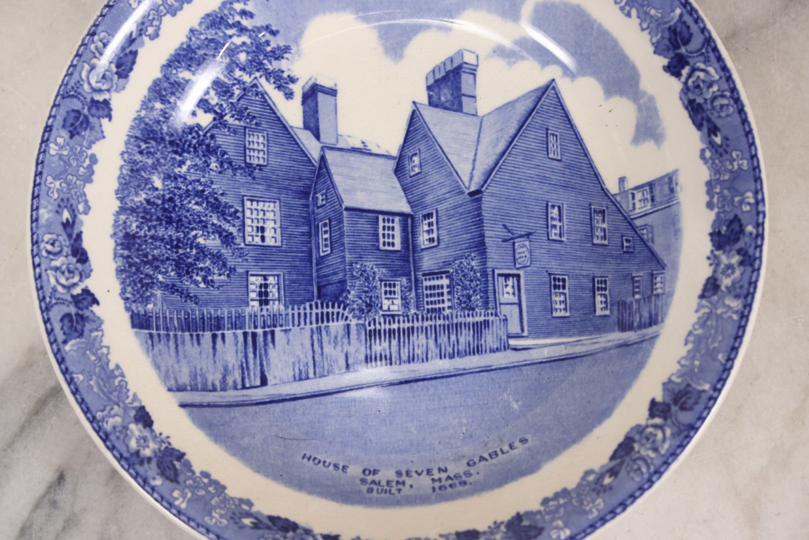 Lot 076 - Vintage Daniel Low & Co. “House Of Seven Gables, Salem, Mass.” Blue Transferware Souvenir Plate By J. Roth, Staffordshire, England, 7-1/4" Diameter