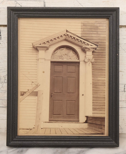 Lot 077 - Antique Photograph Of The Doorway Of 118 Derby Street, Salem, Massachusetts, Photographed By Moulton-Erickson Photo Co., Published By Frank Cousins' Bee-Hive, In Vintage Double-Glass Frame, 8-1/8" x 10-1/8"