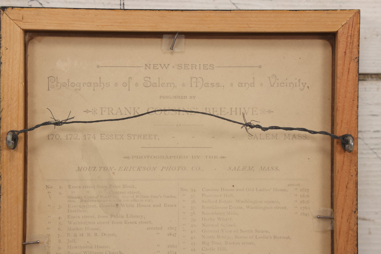 Lot 077 - Antique Photograph Of The Doorway Of 118 Derby Street, Salem, Massachusetts, Photographed By Moulton-Erickson Photo Co., Published By Frank Cousins' Bee-Hive, In Vintage Double-Glass Frame, 8-1/8" x 10-1/8"