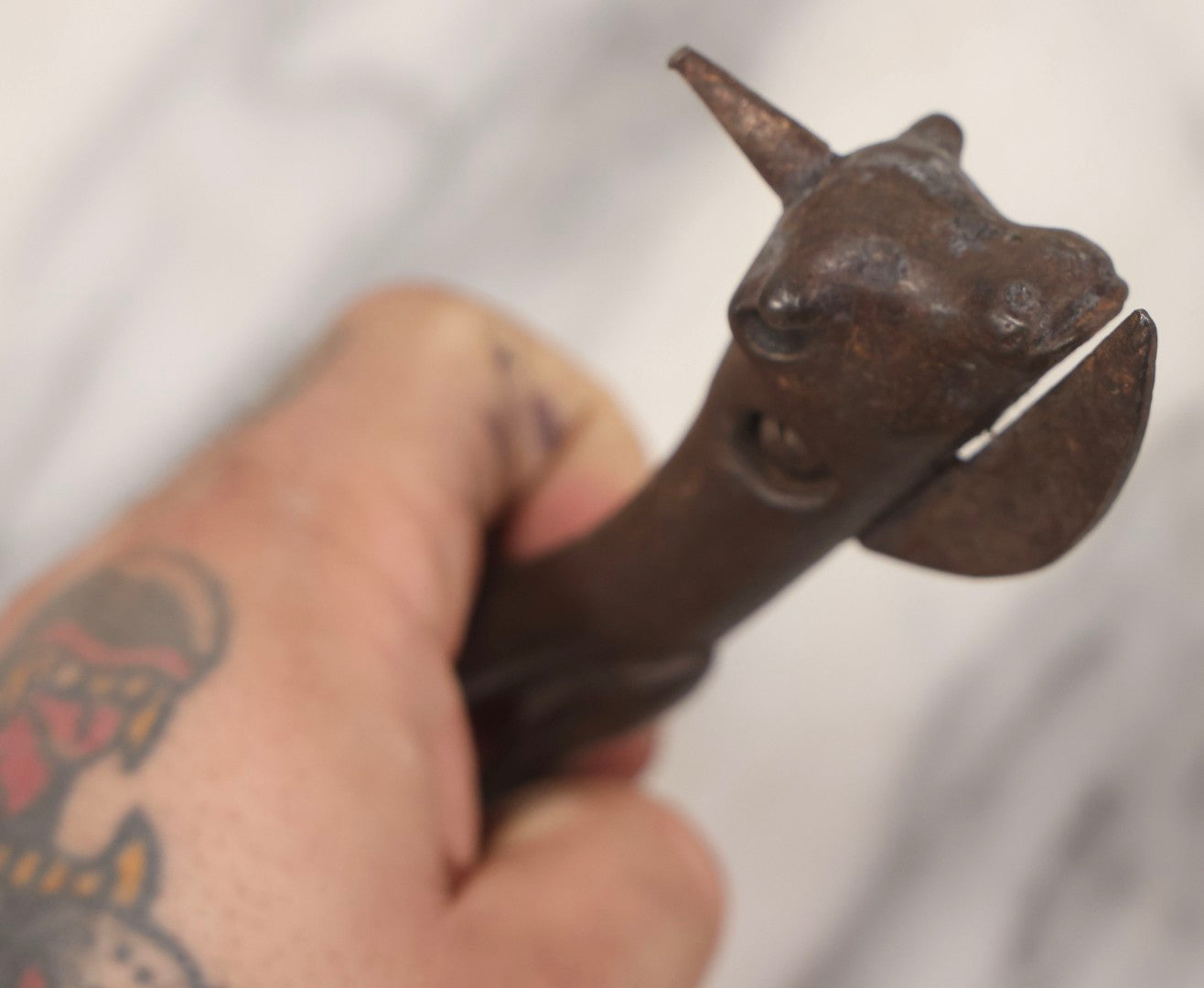Lot 082 - Antique Cast Iron “Bully Beef” Can Opener With Cow's Head Form And Spike, 6-3/4" L