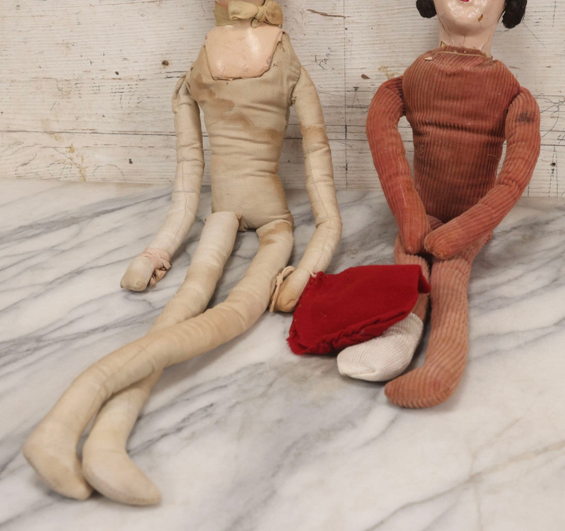 Lot 083 - Pair Of Antique Painted Composition Head Boudoir Dolls With Stuffed Fabric Bodies, 29" And 22" L