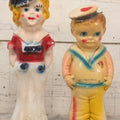 Lot 084 - Pair Of Vintage Chalkware Sailor Man And Sailor Girl Carnival Prize Figures, 13" And 15" H