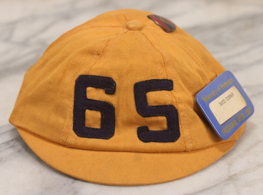 Lot 085 - Vintage Orange Cap With “65” Patch, E. Rosenstein Sons Label, And Two University Pins