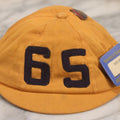 Lot 085 - Vintage Orange Cap With “65” Patch, E. Rosenstein Sons Label, And Two University Pins