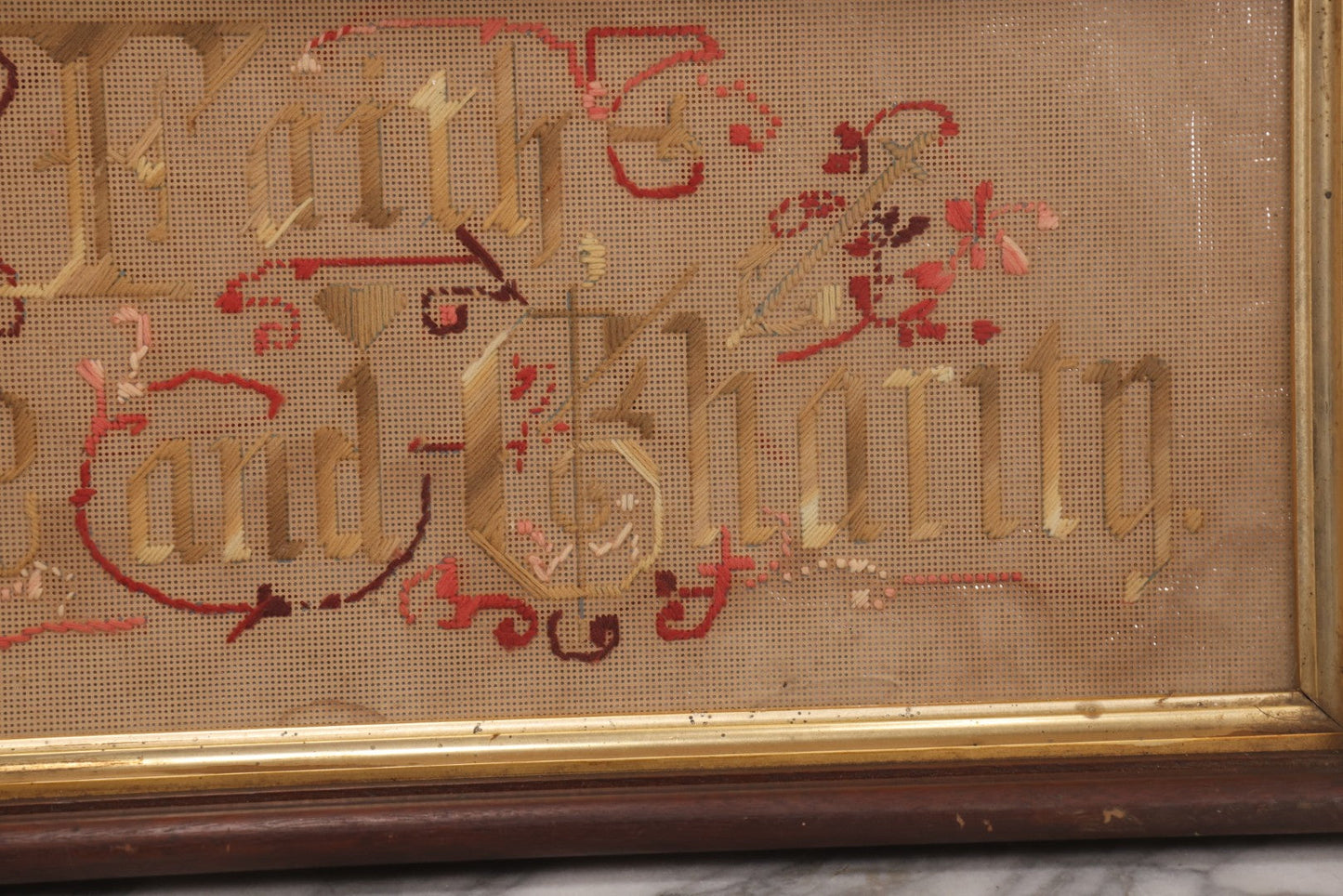 Lot 097 - Antique Victorian Punchwork Embroidery Motto “Faith, Hope, And Charity” In Deep Walnut Frame With Gold Inner Border, 23-1/4" x 10-3/4"