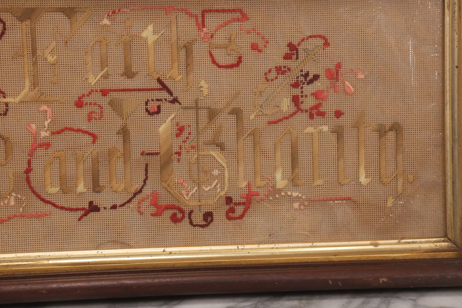 Lot 097 - Antique Victorian Punchwork Embroidery Motto “Faith, Hope, And Charity” In Deep Walnut Frame With Gold Inner Border, 23-1/4" x 10-3/4"