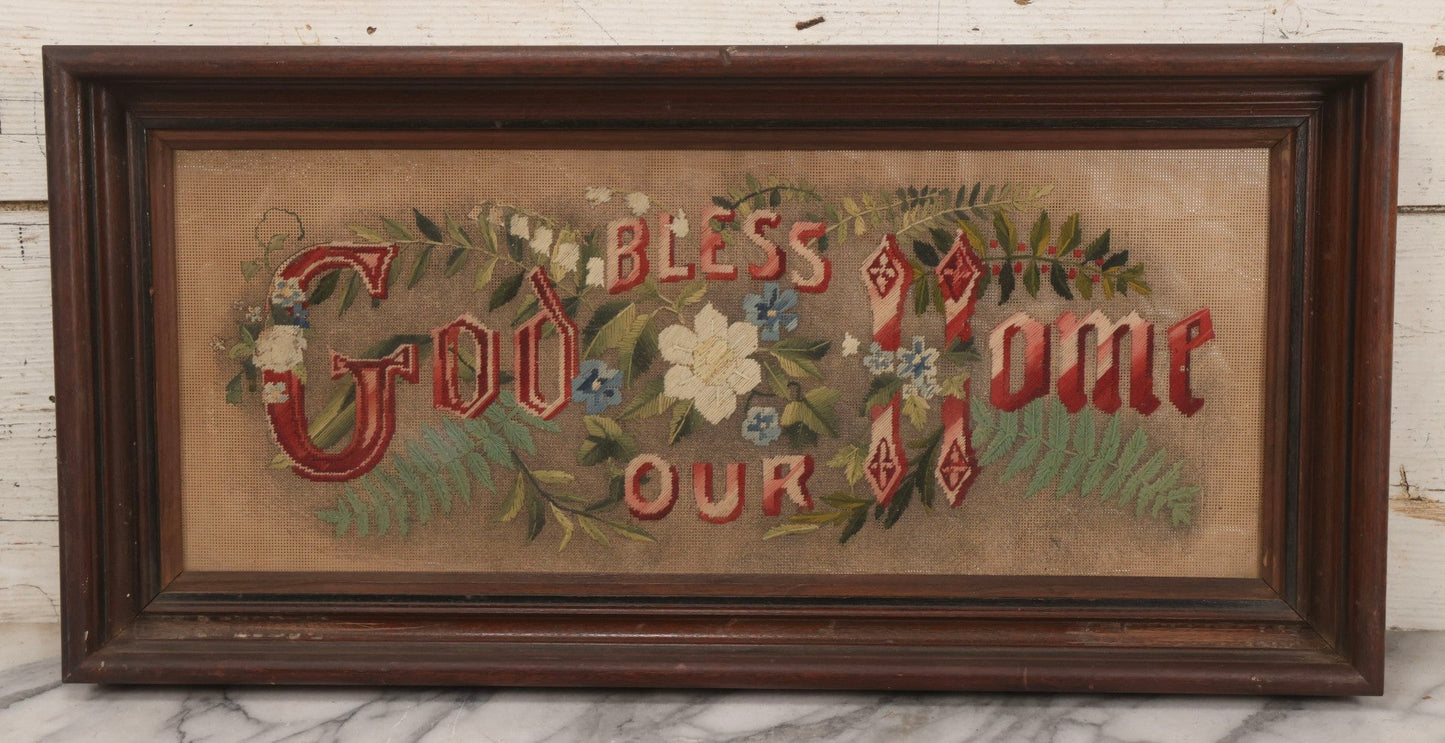 Lot 099 - Antique Victorian Punchwork Embroidery Motto “God Bless Our Home” In Deep Walnut Frame, 24-1/4" x 11-3/4"