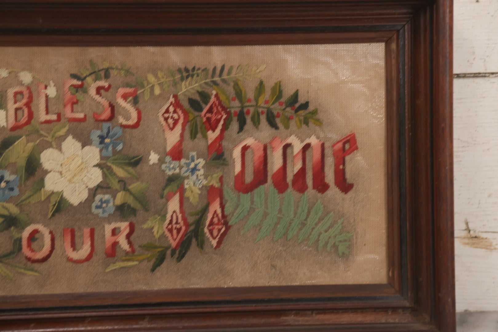 Lot 099 - Antique Victorian Punchwork Embroidery Motto “God Bless Our Home” In Deep Walnut Frame, 24-1/4" x 11-3/4"
