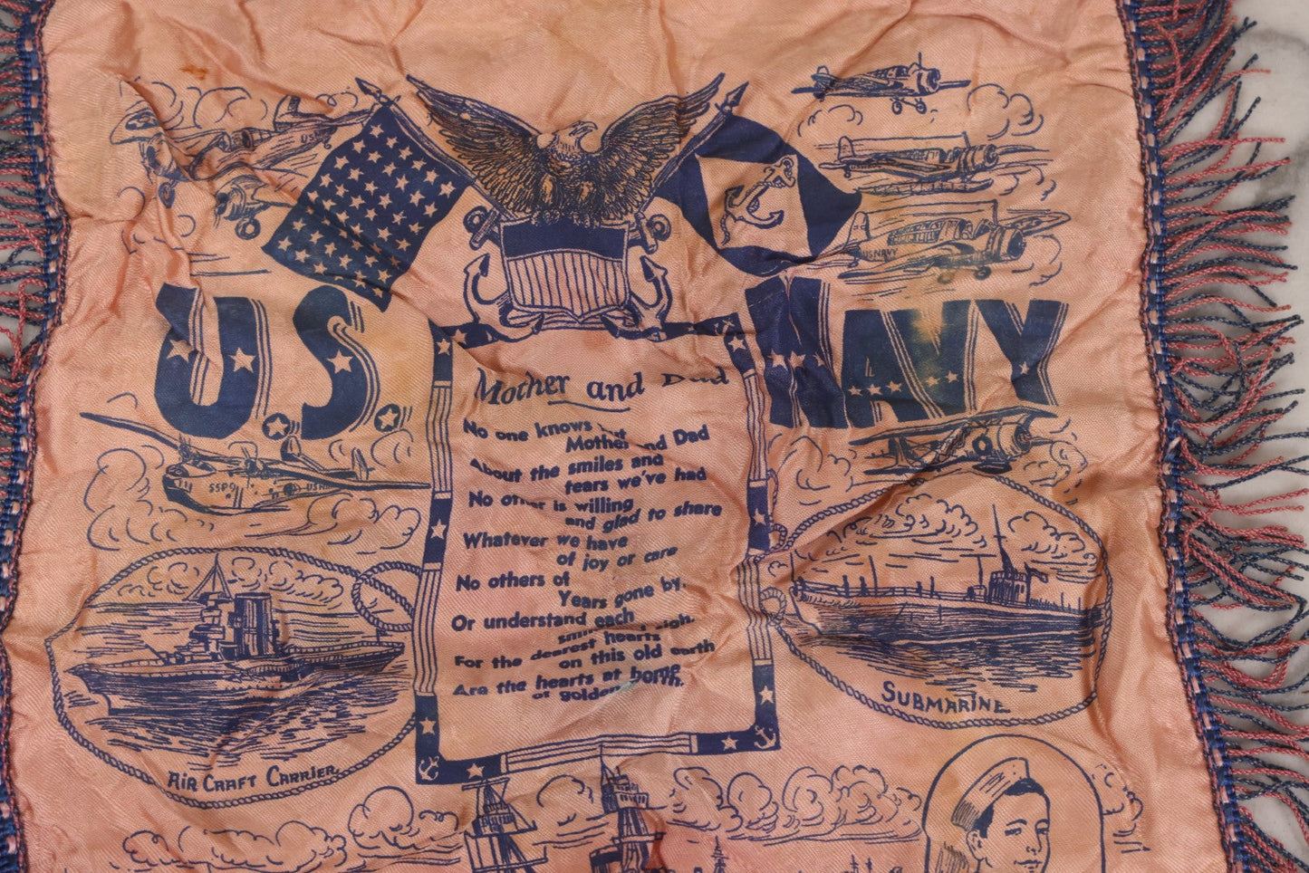 Lot 100 - Vintage World War 2 Era U.S. Navy “Mother And Dad” Silk Pillowcase With Printed Naval Illustrations And Pink-Blue Fringe