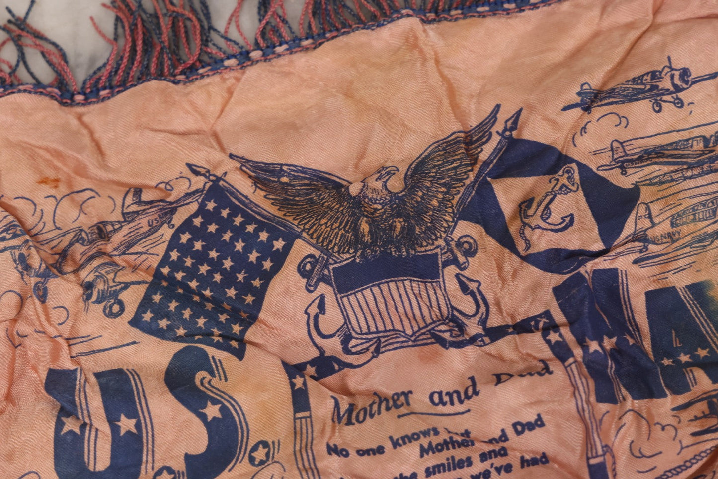 Lot 100 - Vintage World War 2 Era U.S. Navy “Mother And Dad” Silk Pillowcase With Printed Naval Illustrations And Pink-Blue Fringe