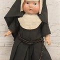 Lot 103 - Vintage Composition Nun Doll With Black And White Vestments And Crucifix, Missing One Shoe, 10-3/4" H
