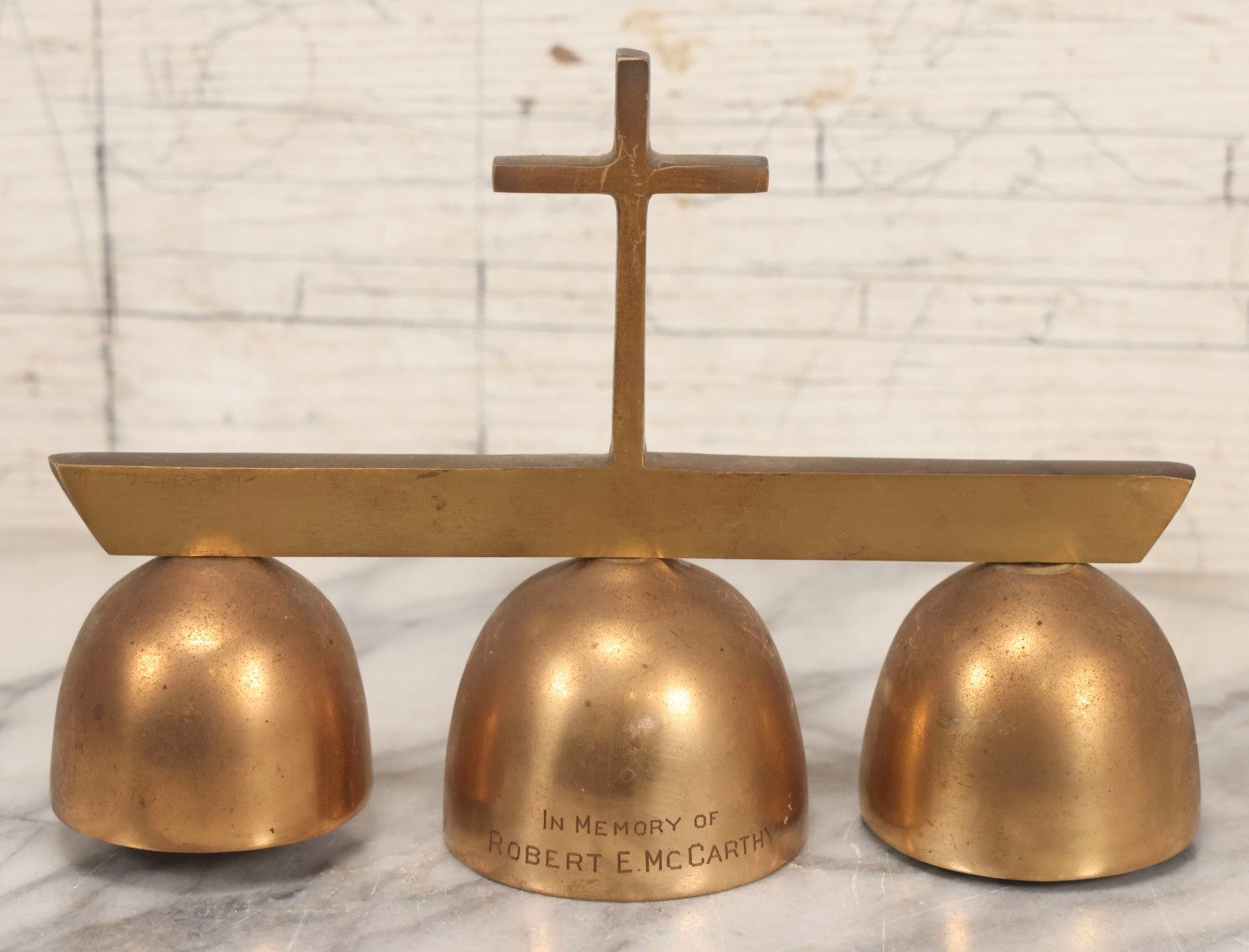 Lot 104 - Vintage Brass Triple Church Bell With Cross Handle, Engraved “In Memory Of Robert McCarthy," 8" L