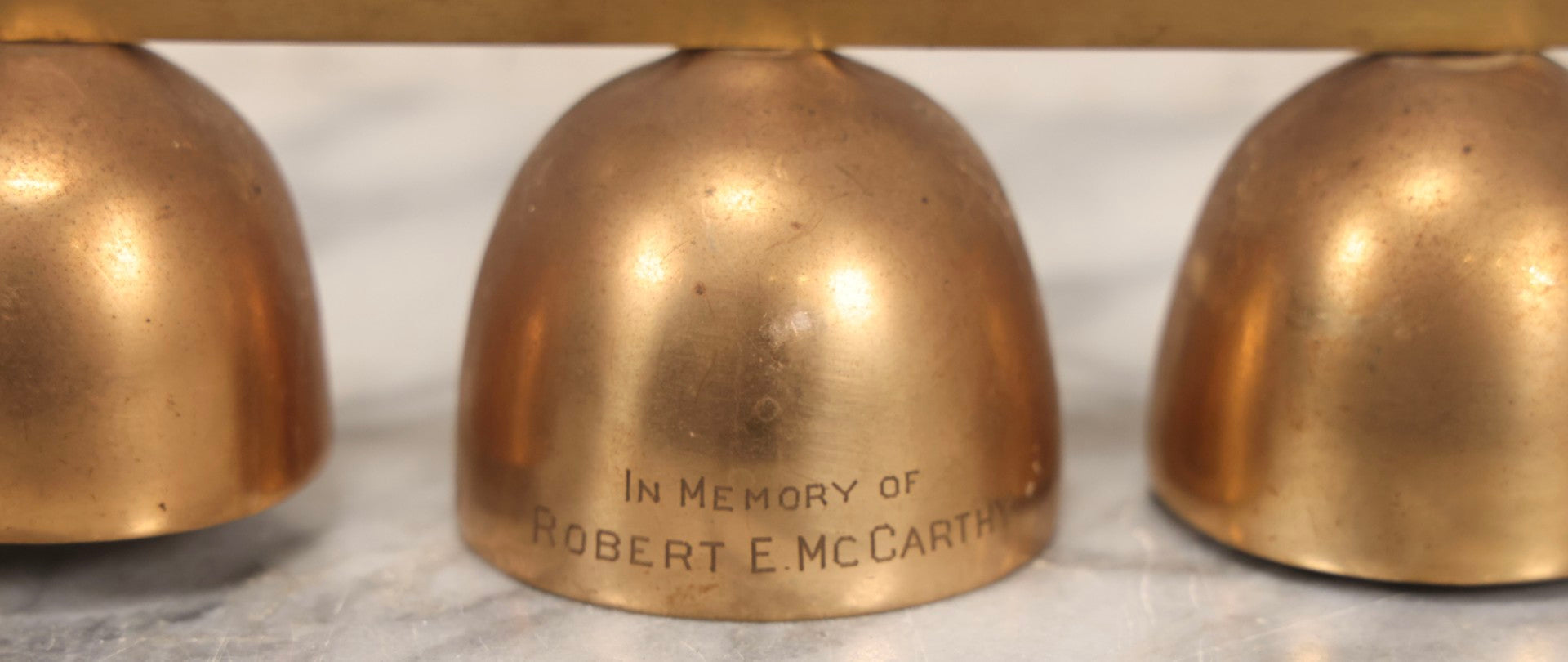 Lot 104 - Vintage Brass Triple Church Bell With Cross Handle, Engraved “In Memory Of Robert McCarthy," 8" L