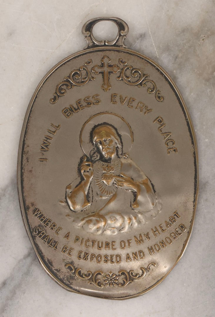 Lot 106 - Antique Pressed Brass Sacred Heart Wall Plaque With “I Will Bless Every Place” Inscription, 3-1/8" x 4-7/8"