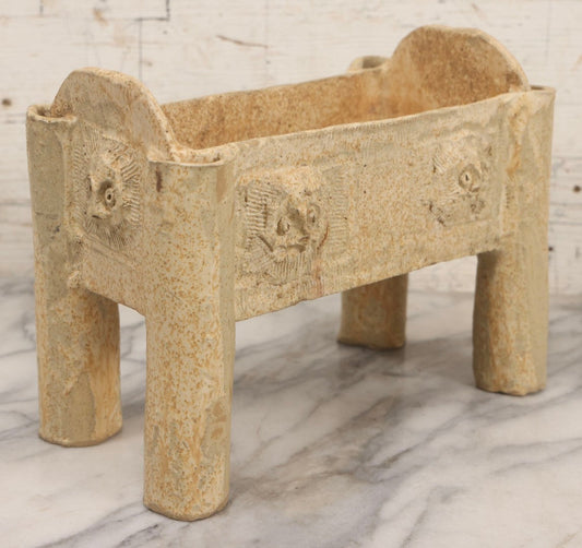 Lot 108 - Vintage Pre-Columbian Style Replica Hand Built Four-Legged Pottery Planter With Appliqué Face Masks, 11-3/4" L