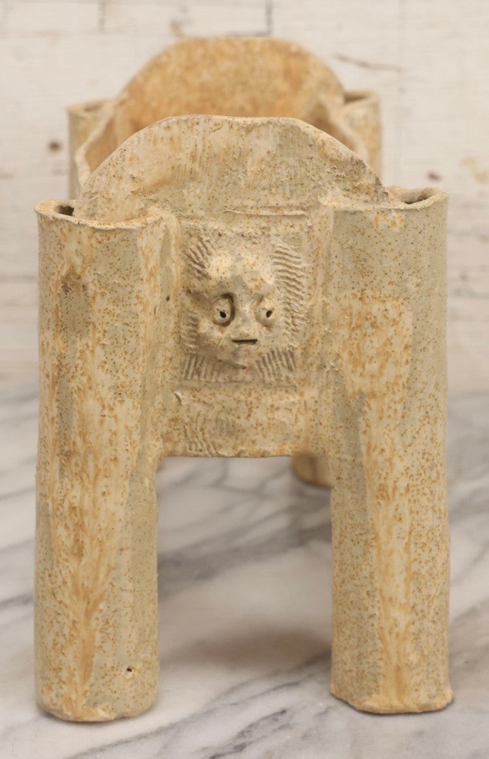 Lot 108 - Vintage Pre-Columbian Style Replica Hand Built Four-Legged Pottery Planter With Appliqué Face Masks, 11-3/4" L