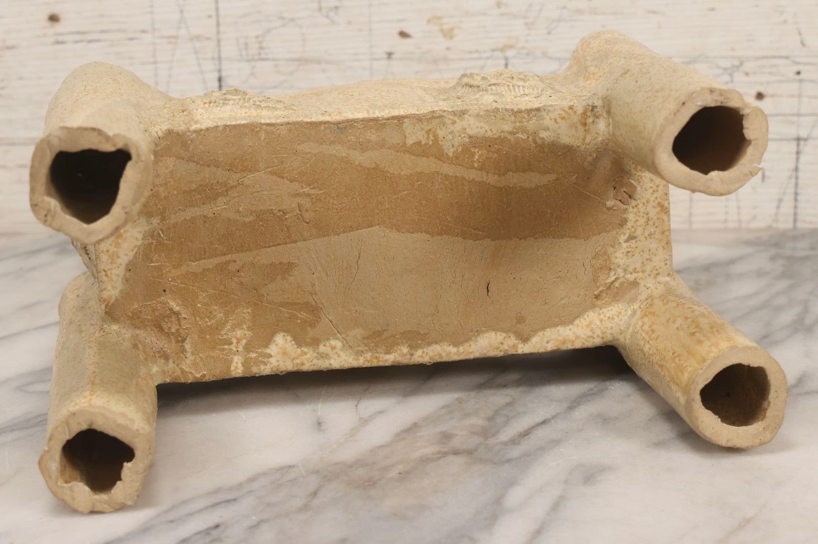 Lot 108 - Vintage Pre-Columbian Style Replica Hand Built Four-Legged Pottery Planter With Appliqué Face Masks, 11-3/4" L