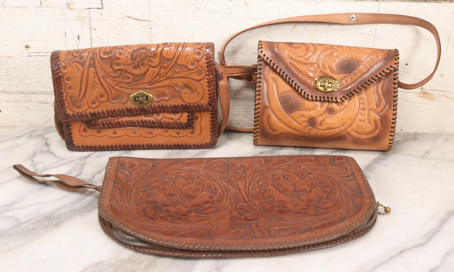 Lot 111 - Grouping Of Three Vintage Tooled Leather Purses With Handtooled Western-Style Designs, Leather Stitching
