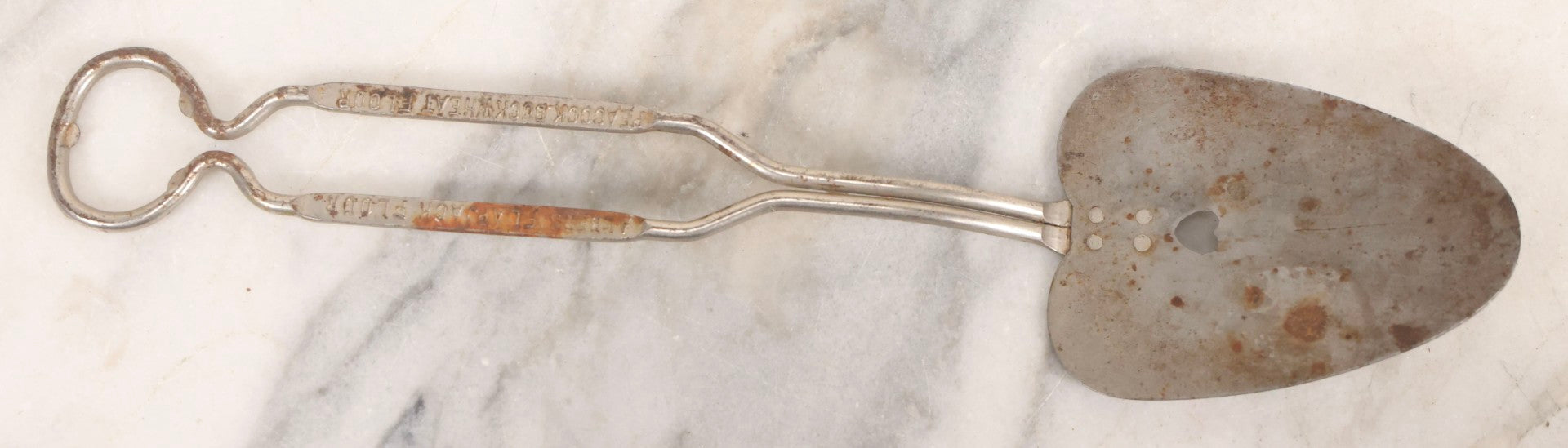 Lot 114 - Vintage Steel Advertising Spatula For Albers Flapjack Flour And Peacock Buckwheat Flour, Patented, With Heart Cutout, 11-1/8" L