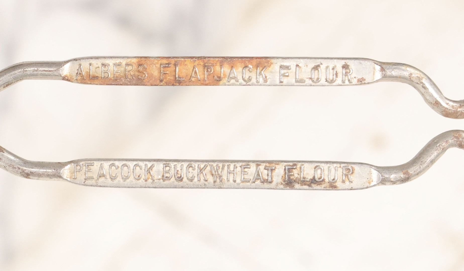 Lot 114 - Vintage Steel Advertising Spatula For Albers Flapjack Flour And Peacock Buckwheat Flour, Patented, With Heart Cutout, 11-1/8" L
