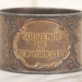 Lot 118 - Antique Pot Metal Souvenir Napkin Ring Featuring New York City Landmarks Including Statue Of Liberty, Grant's Tomb And Flatiron Building