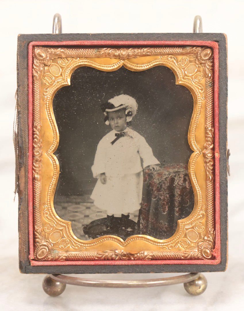 Lot 128 - Antique 1/6th Plate Ambrotype Photograph Of Young Child In White Dress And Feathered Hat, In Half Leatherette Union Case