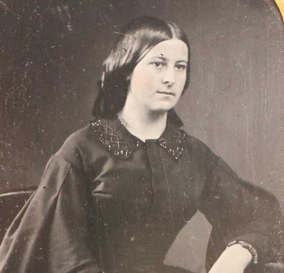 Lot 129 - Antique 1/9th Plate Tintype Photograph Of Young Woman Seated In Dark Dress, In Full Split Leatherette Union Case