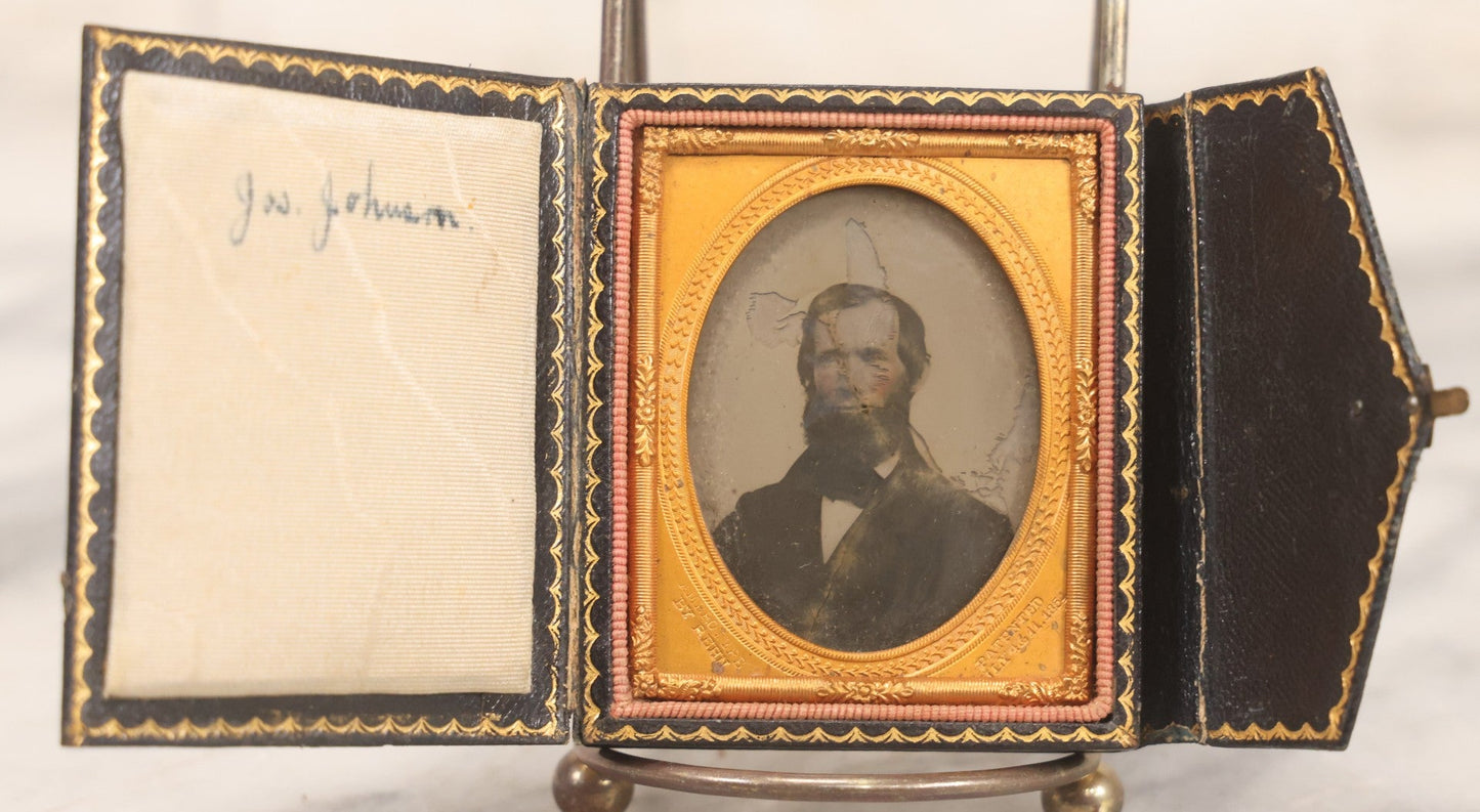 Lot 131 - Antique 1/9th Plate Ambrotype Photograph Of Bearded Man, Identified As “Jos. Johnson,” In Full Leatherette Folding Case, Photographed By Rehn, Circa 1854, Note Wear
