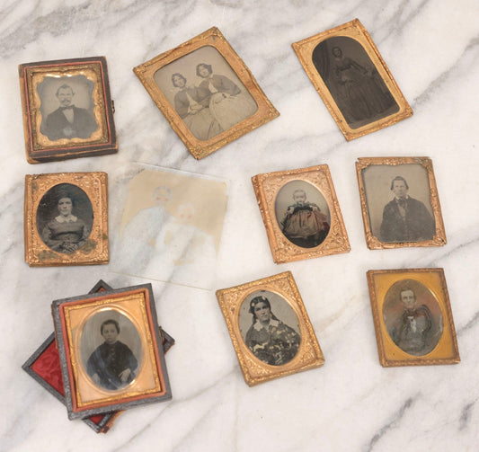 Lot 134 - Grouping Of Eight Antique Photographs Including Daguerreotype, Ambrotypes, Ruby Ambrotypes, And Tintypes, Depicting Men, Women, And Children