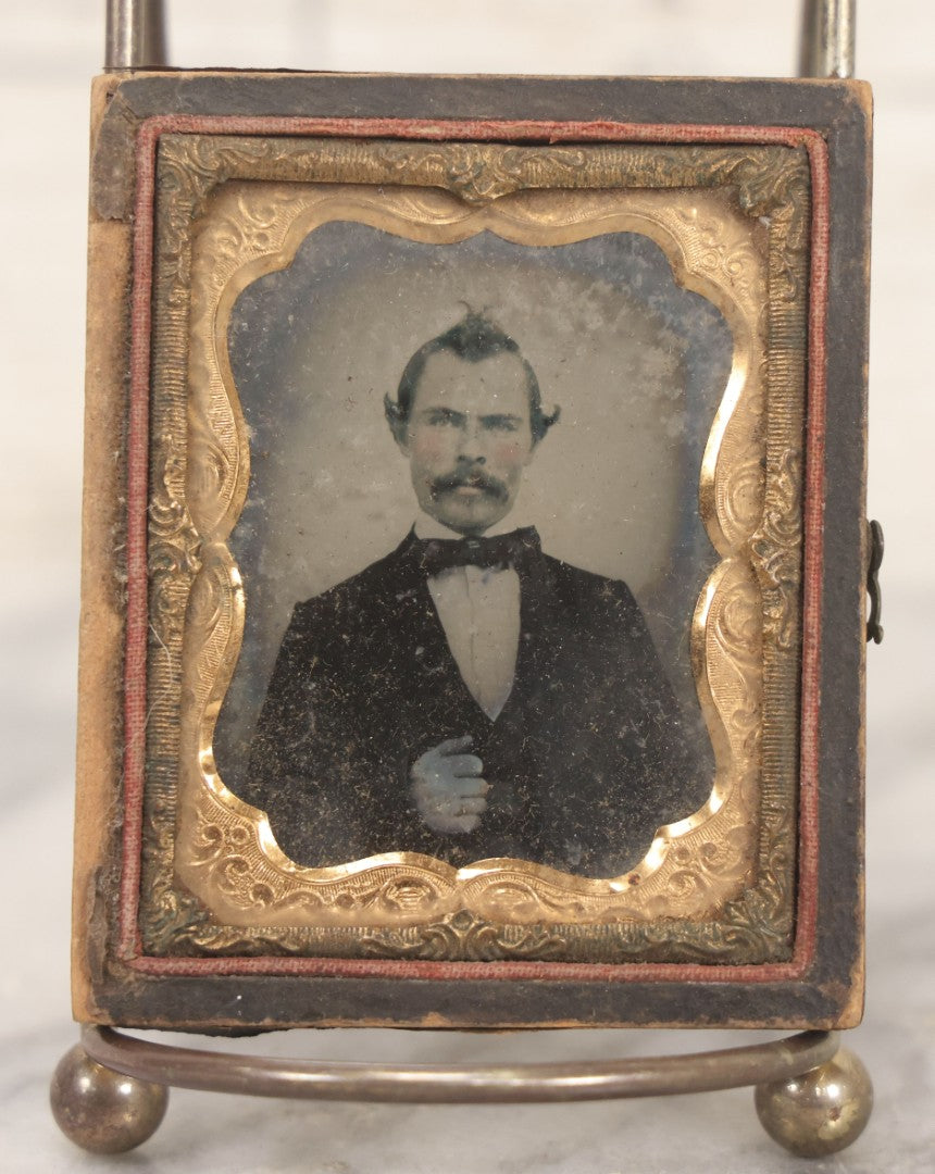 Lot 134 - Grouping Of Eight Antique Photographs Including Daguerreotype, Ambrotypes, Ruby Ambrotypes, And Tintypes, Depicting Men, Women, And Children