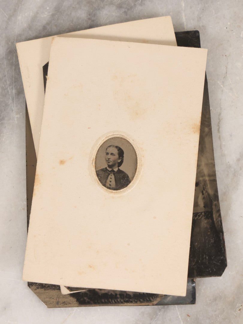 Lot 135 - Grouping Of Nine Antique Tintype Photographs Including Ladies With Parasol, Man In Bowler Hat, Group Portrait, And Child In Miniature Wood Frame