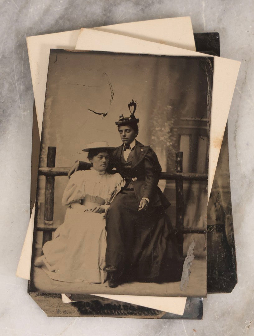 Lot 135 - Grouping Of Nine Antique Tintype Photographs Including Ladies With Parasol, Man In Bowler Hat, Group Portrait, And Child In Miniature Wood Frame