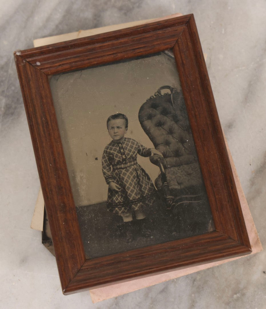 Lot 135 - Grouping Of Nine Antique Tintype Photographs Including Ladies With Parasol, Man In Bowler Hat, Group Portrait, And Child In Miniature Wood Frame