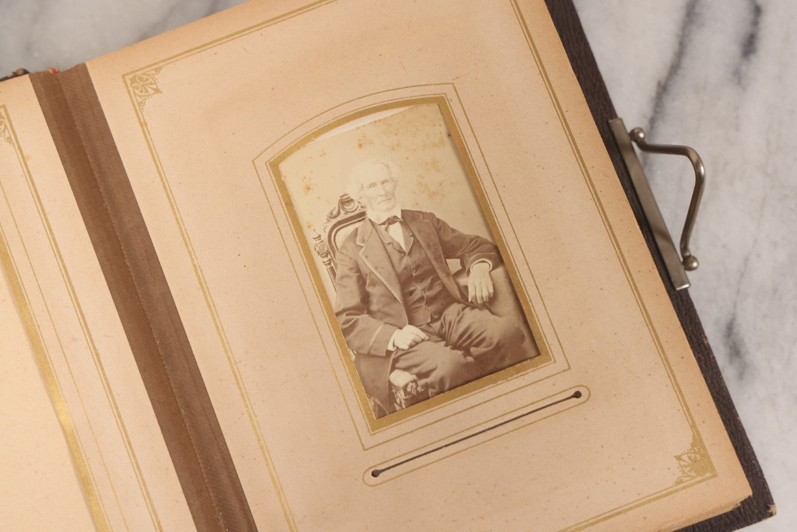 Lot 140 - Antique Portrait Photograph Album With 15 Carte De Visite C.D.V.., 2 Cabinet Card, And 3 Tintype Photographs Of Men, Women, And Children