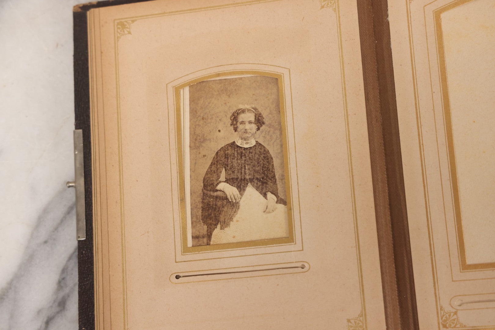 Lot 140 - Antique Portrait Photograph Album With 15 Carte De Visite C.D.V.., 2 Cabinet Card, And 3 Tintype Photographs Of Men, Women, And Children