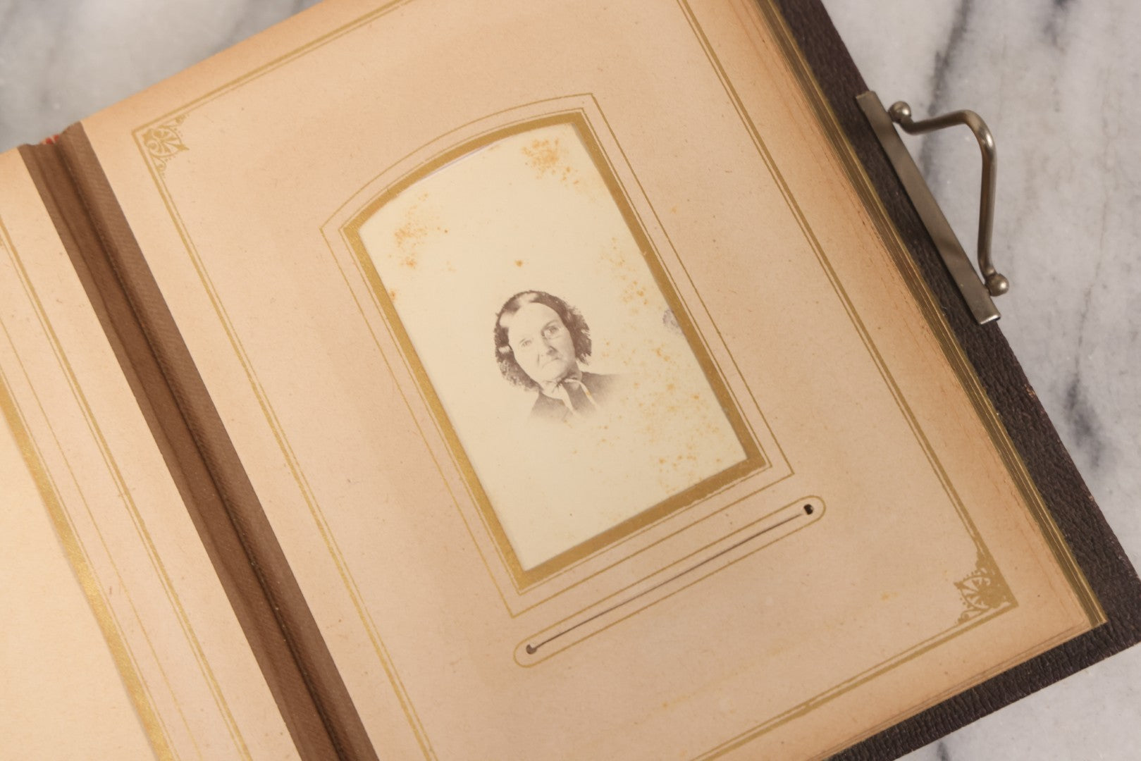 Lot 140 - Antique Portrait Photograph Album With 15 Carte De Visite C.D.V.., 2 Cabinet Card, And 3 Tintype Photographs Of Men, Women, And Children