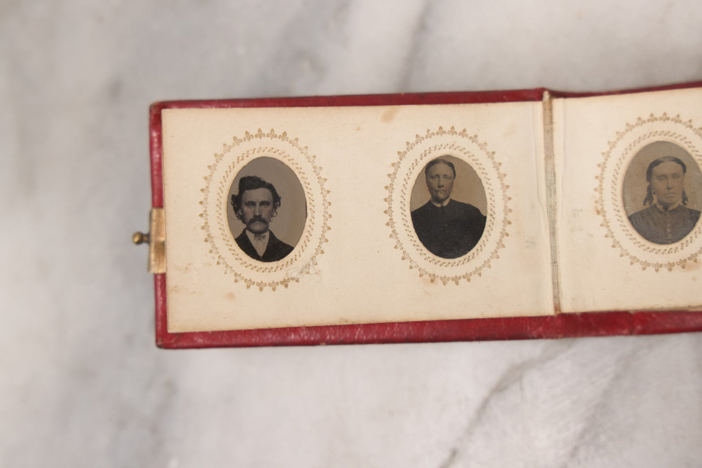 Lot 141 - Antique Gem Tintype Album With 26 Gem Tintype Photographs Including Man In Uniform, Note Binding In Poor Condition