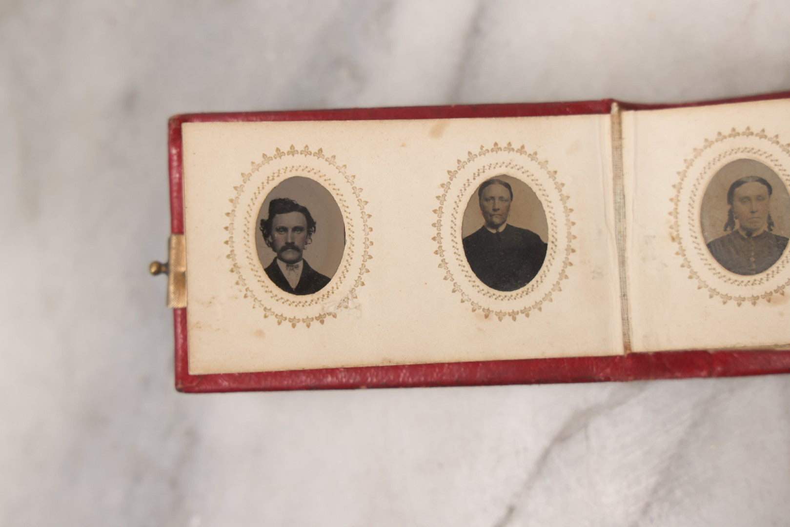 Lot 141 - Antique Gem Tintype Album With 26 Gem Tintype Photographs Including Man In Uniform, Note Binding In Poor Condition