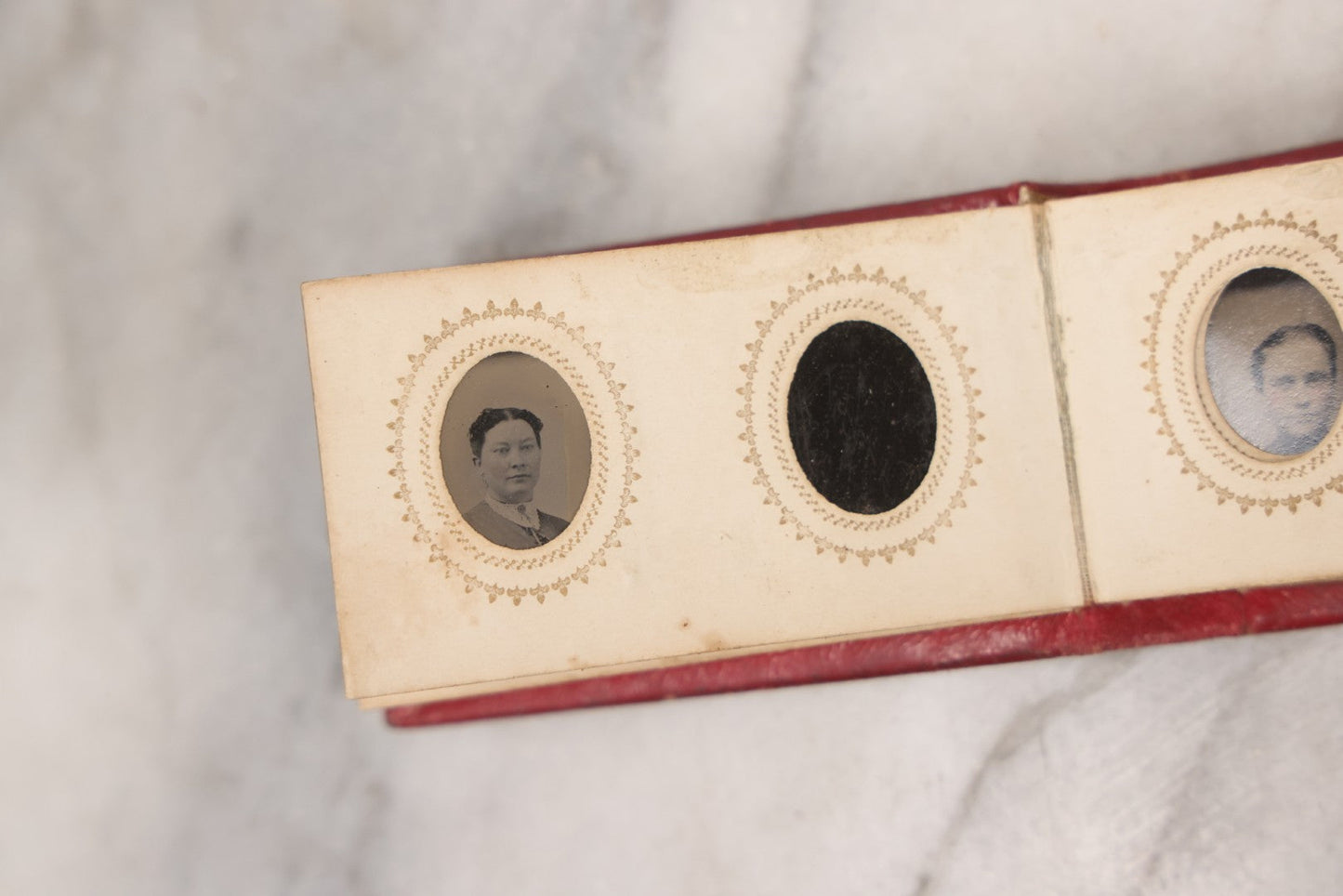 Lot 141 - Antique Gem Tintype Album With 26 Gem Tintype Photographs Including Man In Uniform, Note Binding In Poor Condition