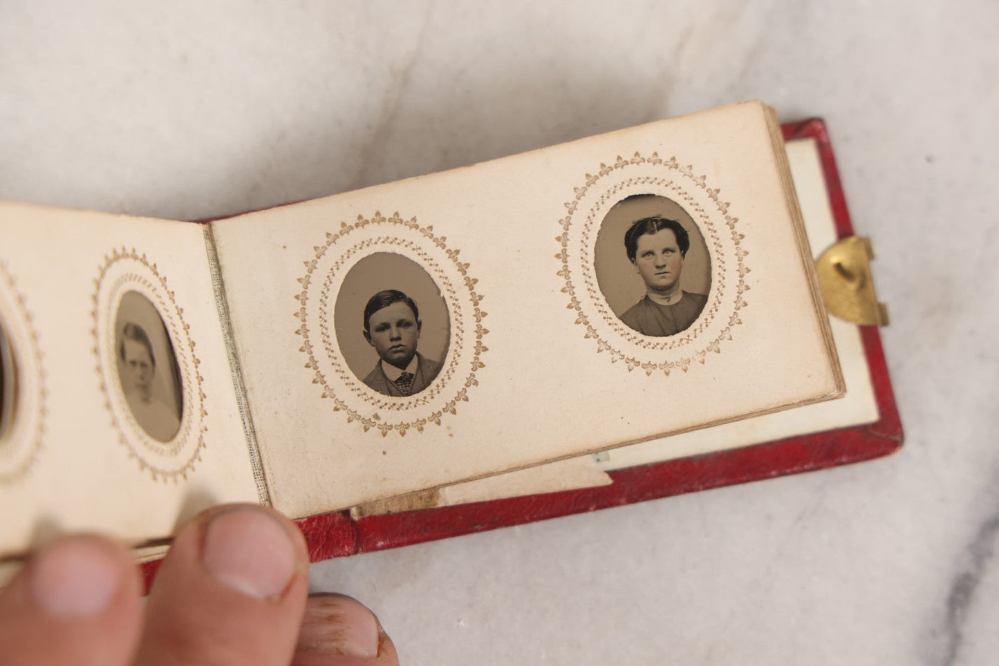 Lot 141 - Antique Gem Tintype Album With 26 Gem Tintype Photographs Including Man In Uniform, Note Binding In Poor Condition