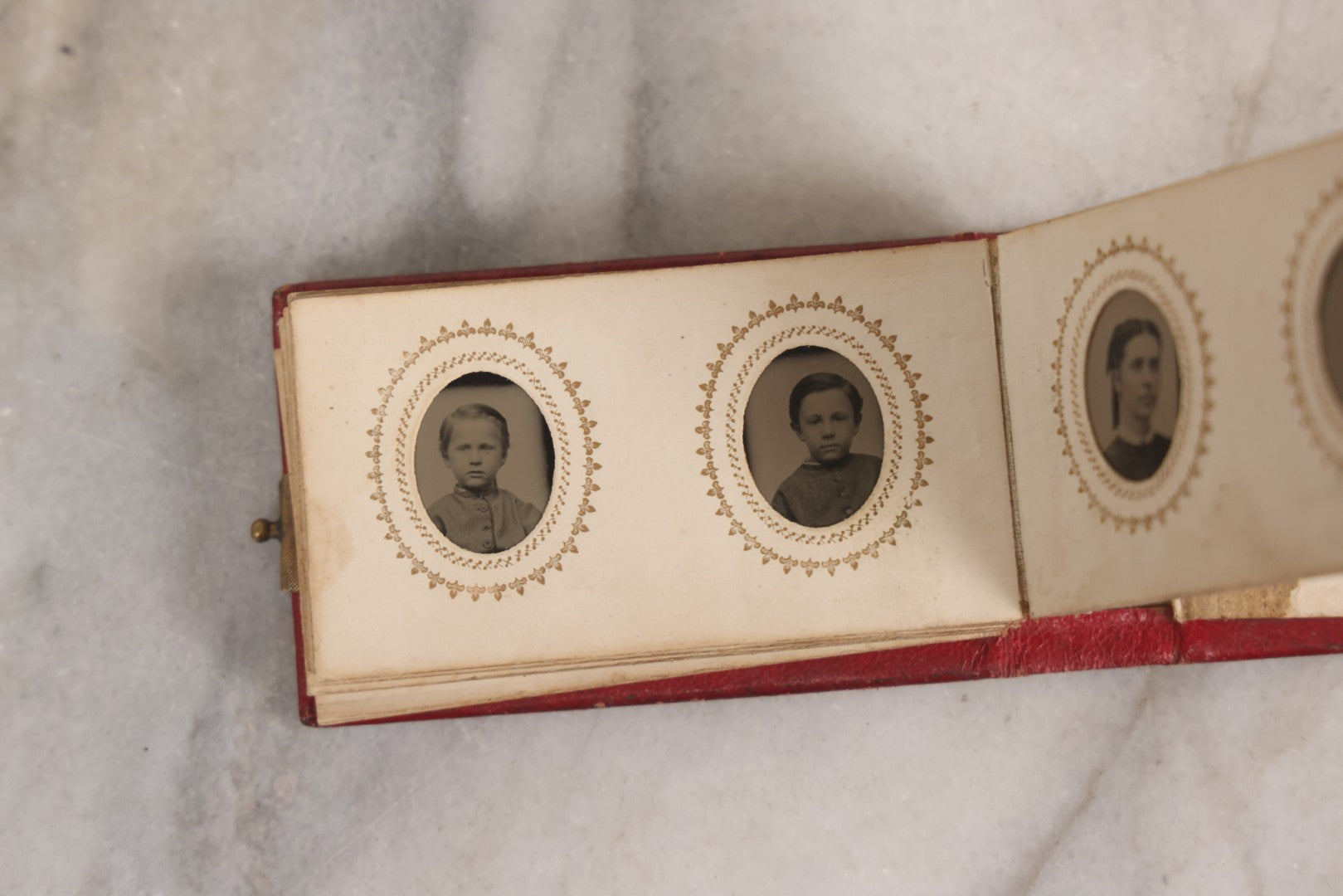 Lot 141 - Antique Gem Tintype Album With 26 Gem Tintype Photographs Including Man In Uniform, Note Binding In Poor Condition