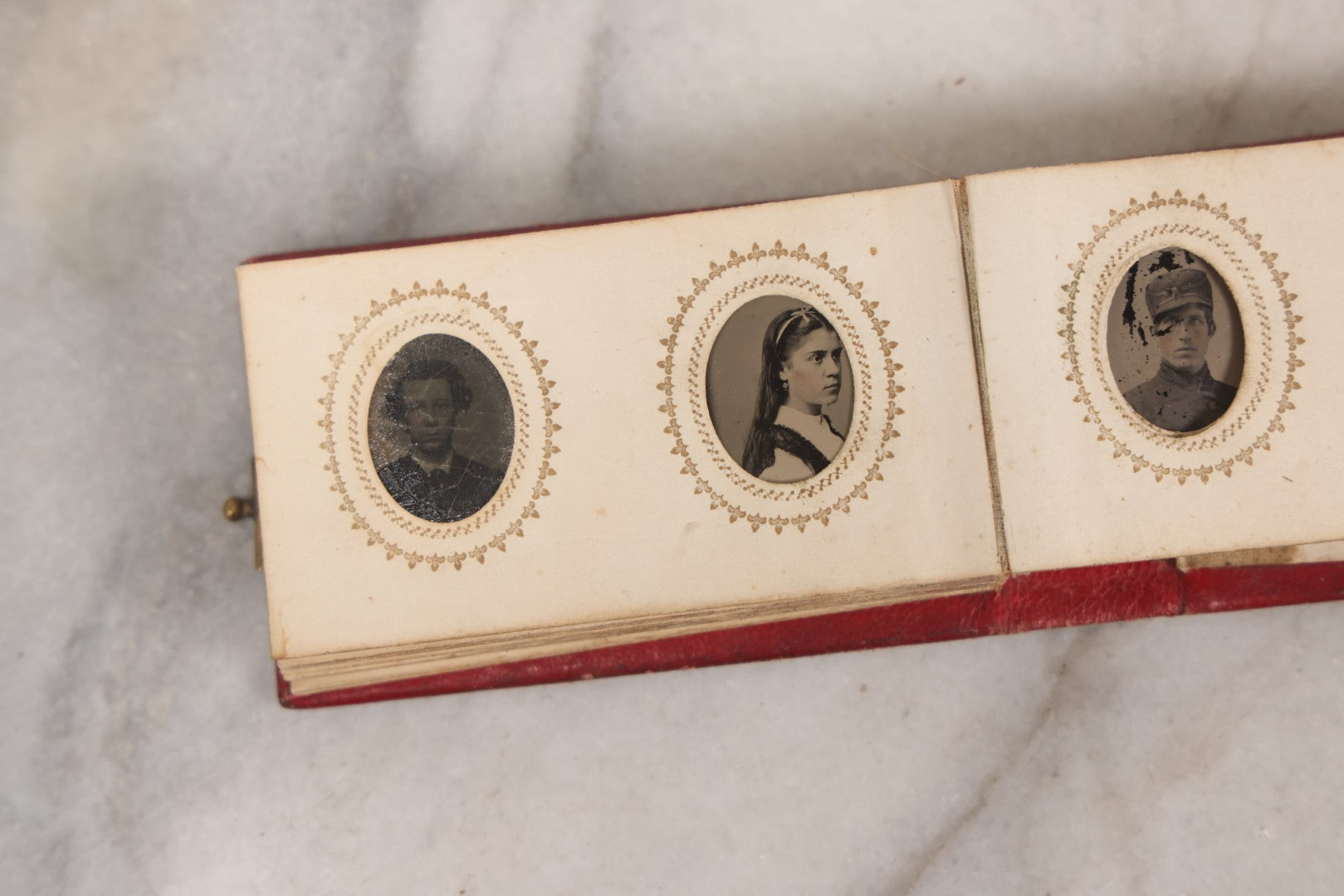 Lot 141 - Antique Gem Tintype Album With 26 Gem Tintype Photographs Including Man In Uniform, Note Binding In Poor Condition