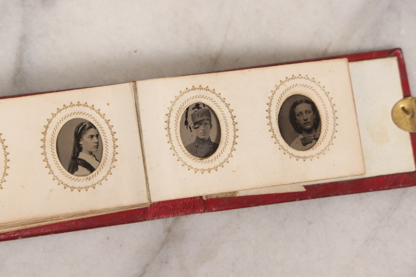 Lot 141 - Antique Gem Tintype Album With 26 Gem Tintype Photographs Including Man In Uniform, Note Binding In Poor Condition